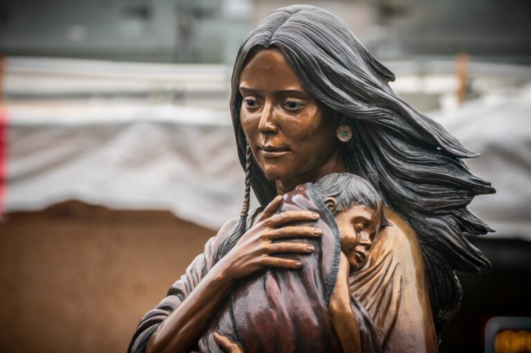 Statue honoring Sacajewea unveiled in neighborhood named for her son